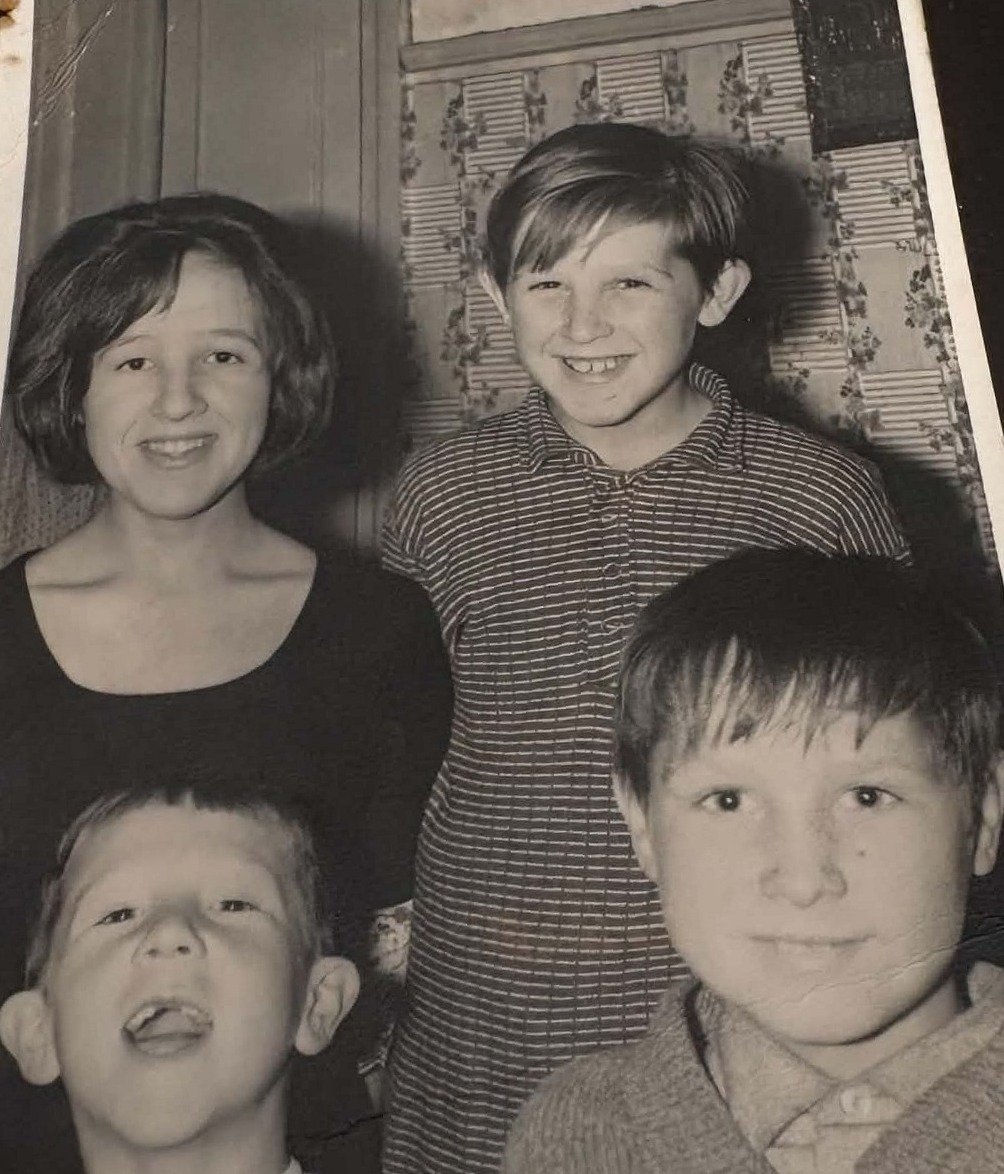 The same photograph, original and black and white